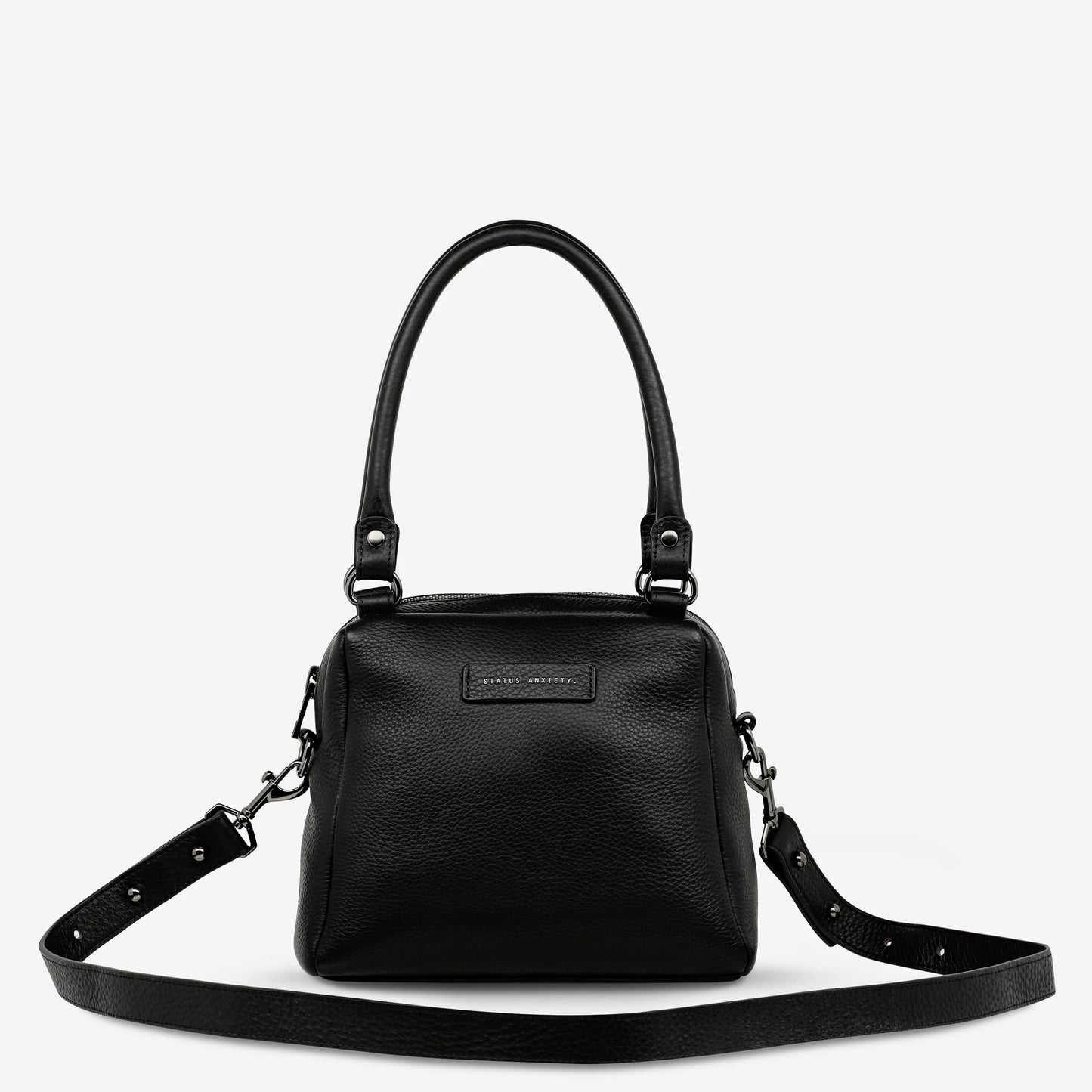 Good things come in small packages. Mini Mountains is a more compact version of the iconic Last Mountains bag. This day to night companion can be worn on elbow, shoulder, or cross body (with included long strap). Features a wide-opening main compartment, longer shoulder strap for added comfort, and secret magnet-close pocket on the outside for your phone etc.