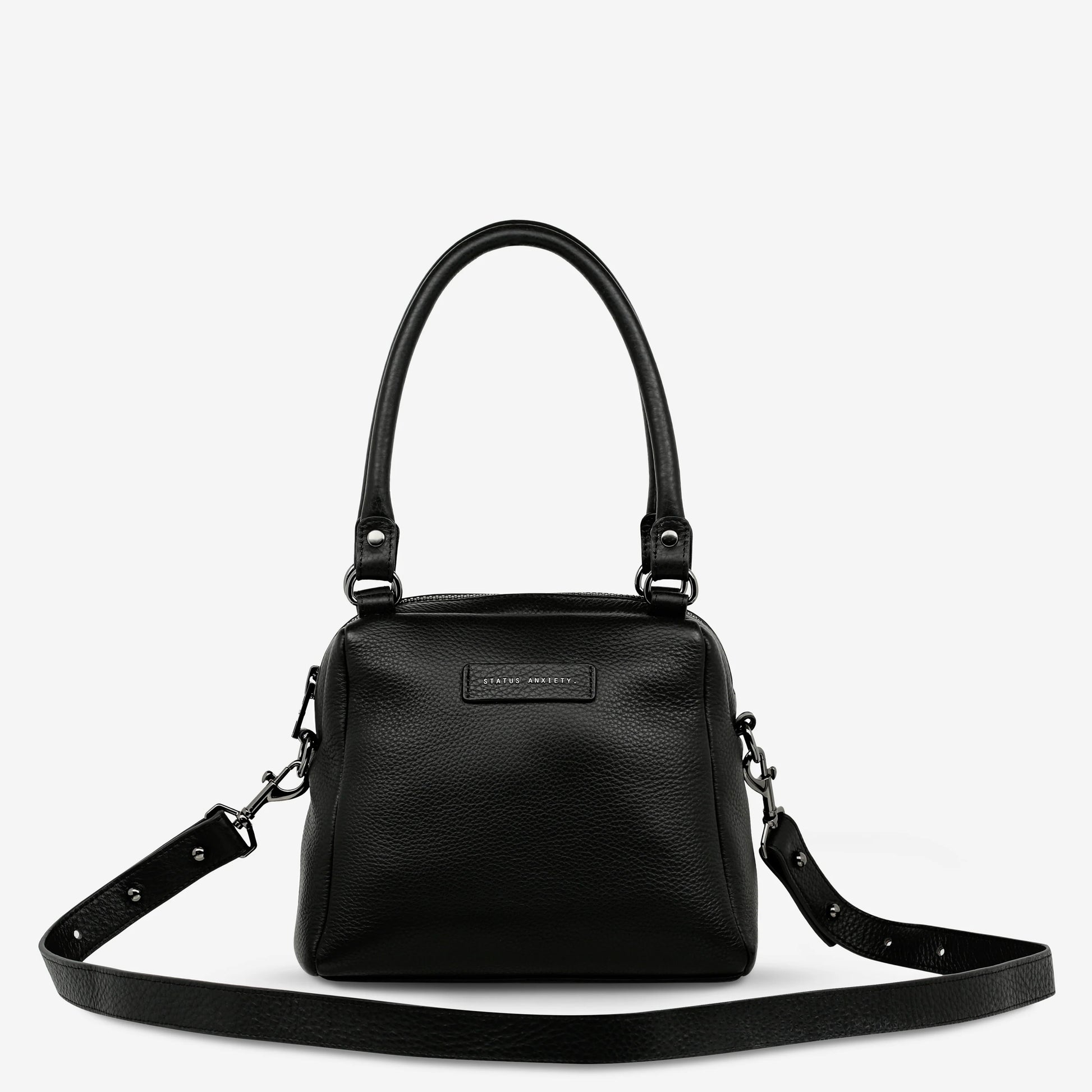 Good things come in small packages. Mini Mountains is a more compact version of the iconic Last Mountains bag. This day to night companion can be worn on elbow, shoulder, or cross body (with included long strap). Features a wide-opening main compartment, longer shoulder strap for added comfort, and secret magnet-close pocket on the outside for your phone etc.