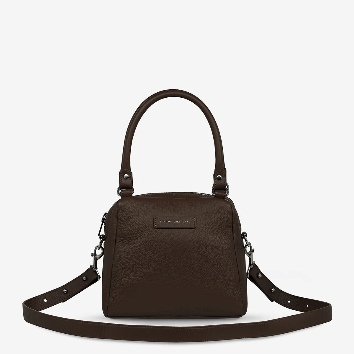 Good things come in small packages. Mini Mountains is a more compact version of the iconic Last Mountains bag. This day to night companion can be worn on elbow, shoulder, or cross body (with included long strap). Features a wide-opening main compartment, longer shoulder strap for added comfort, and secret magnet-close pocket on the outside for your phone etc.
Soft shrunken pebble leather
Custom Status Anxiety lining
Back magnet pocket
Internal zipper pocket, and open pockets
Zipper close
Comes in a Status