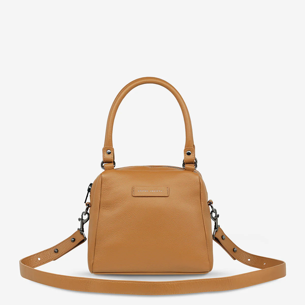 Good things come in small packages. Mini Mountains is a more compact version of the iconic Last Mountains bag. This day to night companion can be worn on elbow, shoulder, or cross body (with included long strap). Features a wide-opening main compartment, longer shoulder strap for added comfort, and secret magnet-close pocket on the outside for your phone etc.