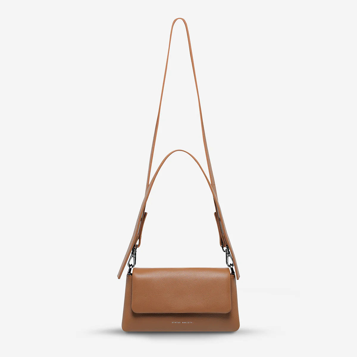 We don't take calling this bag Zenith lightly. As the new high point of your bag collection, 'Zenith' comes with a longer strap for use as a relaxed crossbody, or swap in the shorter strap to transform her into a dressier shoulder bag. On the back of the bag there's a slider pocket for easy phone storage/access, and on the front, a fancy magnet close flap that'll have you opening and closing her just for the hell of it.