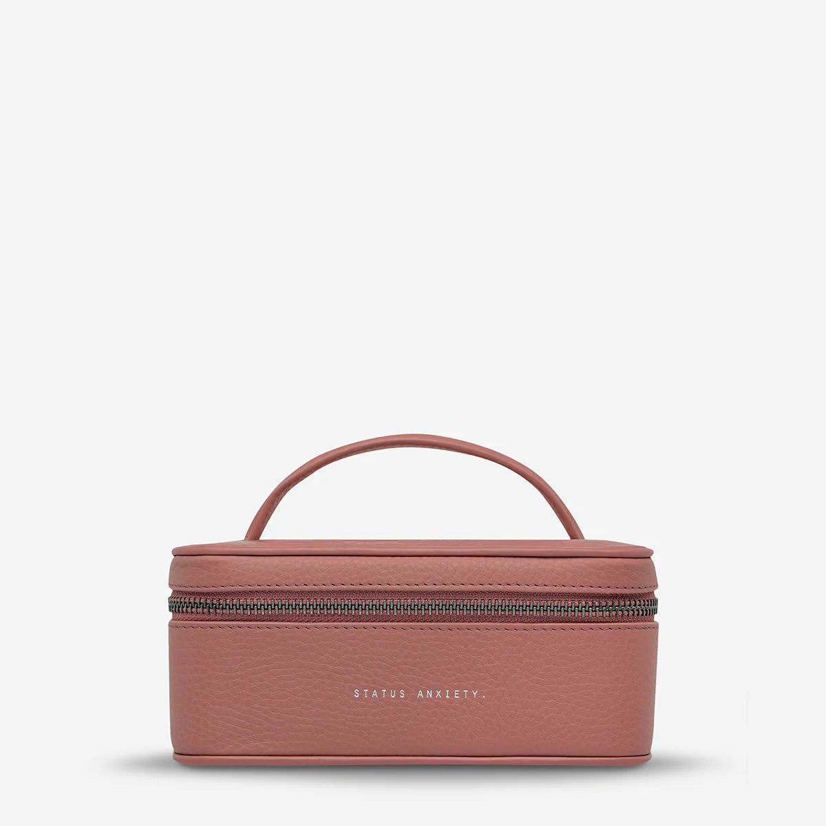 A nifty little case for all your precious personal stuff, such as necklaces, rings, earrings, watches, bracelets etc. The easy snap button straps will keep your rings / earrings neatly arranged on the top flap and throw larger items into the main compartment.
