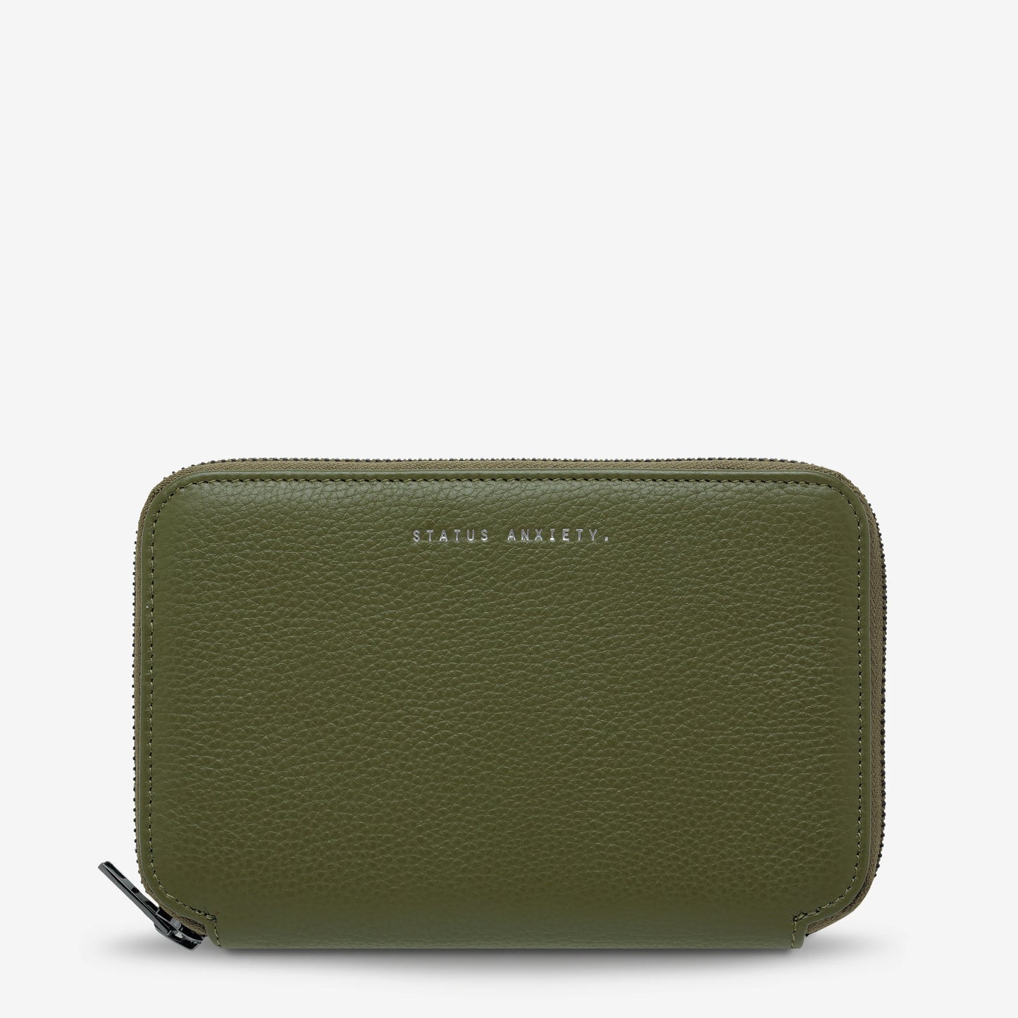 You know you're a real life grown up if you have a travel wallet. The 'Nowhere To Be Found' travel wallet is made of super soft shrunken pebble leather and designed to carry all your travel essentials yet still fit in your back pocket.