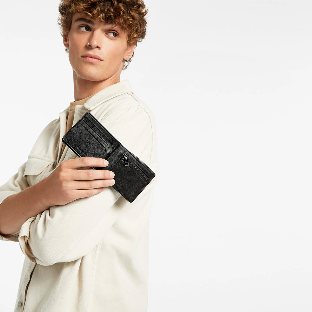 Not that we're proponents of bulk in ones pocket, but should you be looking for a wallet that carries everything whilst maintaining its cool - Leonards your guy. Designed so you can have access to your cash, coins and most frequent cards on opening. There's also another compartment under the snap button for additional (less used) cards and ID space.