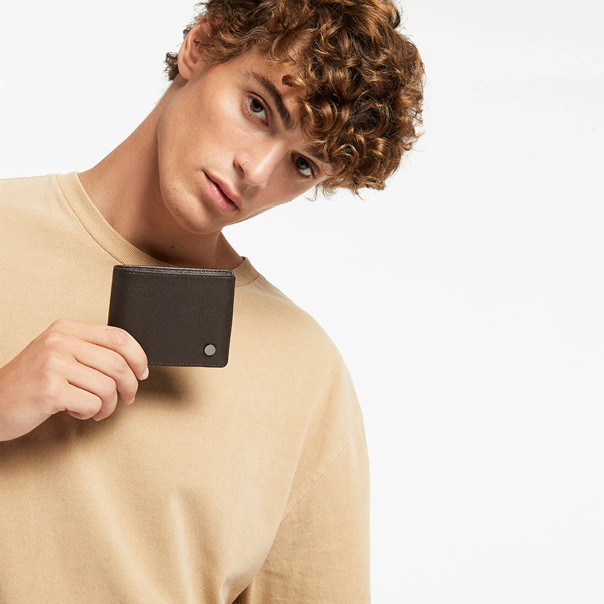 Not that we're proponents of bulk in ones pocket, but should you be looking for a wallet that carries everything whilst maintaining its cool - Leonards your guy. Designed so you can have access to your cash, coins and most frequent cards on opening. There's also another compartment under the snap button for additional (less used) cards and ID space.