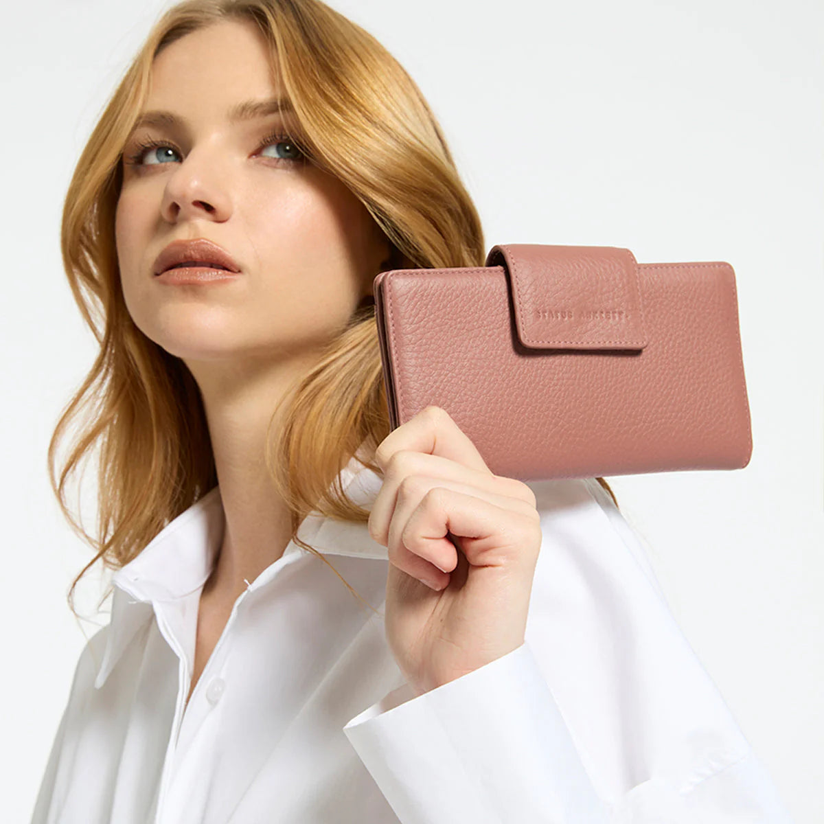 The slow and certain disintegration of what was, the Ruins wallet will handle all your essentials in its slim and compact silhouette. Comes with a large external zip pocket for easy access to loose change and a closure flap to keep everything securely stashed away.