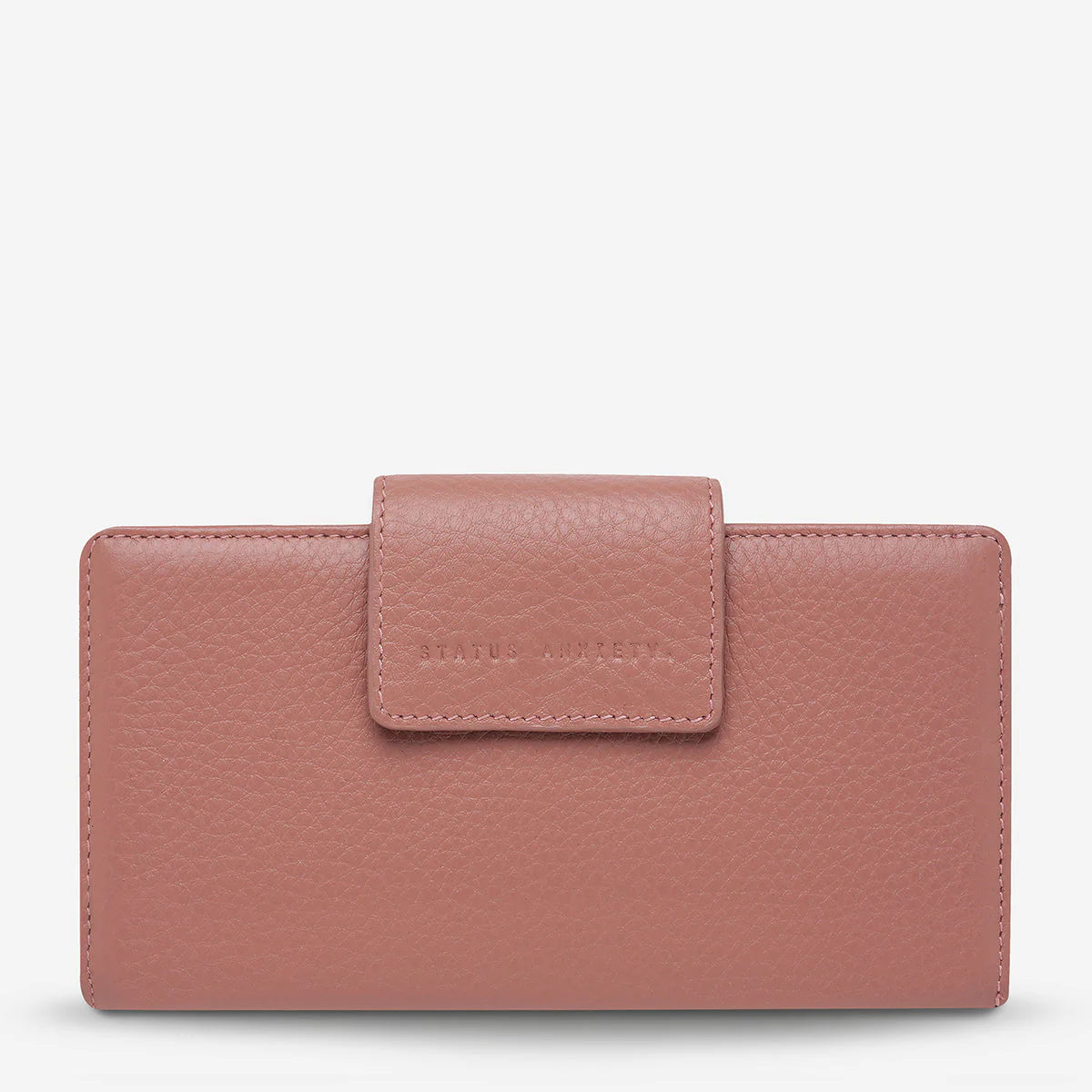 The slow and certain disintegration of what was, the Ruins wallet will handle all your essentials in its slim and compact silhouette. Comes with a large external zip pocket for easy access to loose change and a closure flap to keep everything securely stashed away.