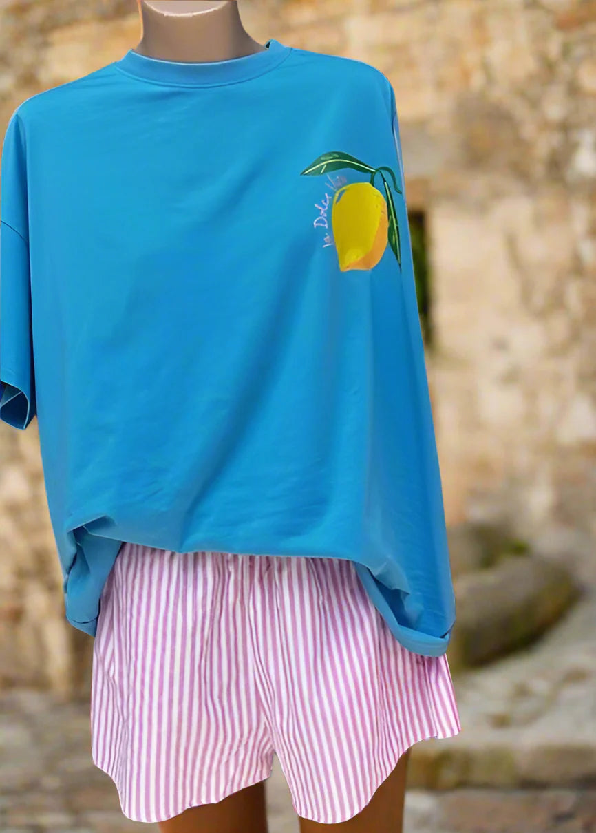 The hottest new sets have landed for an effortless look this summer. It's cute, quirky and a whole lot of fun and we love the Limoncello print on the front and back.
It's a throw on and go kinda Tee & Shorts Day... We are in love with this vibe...
