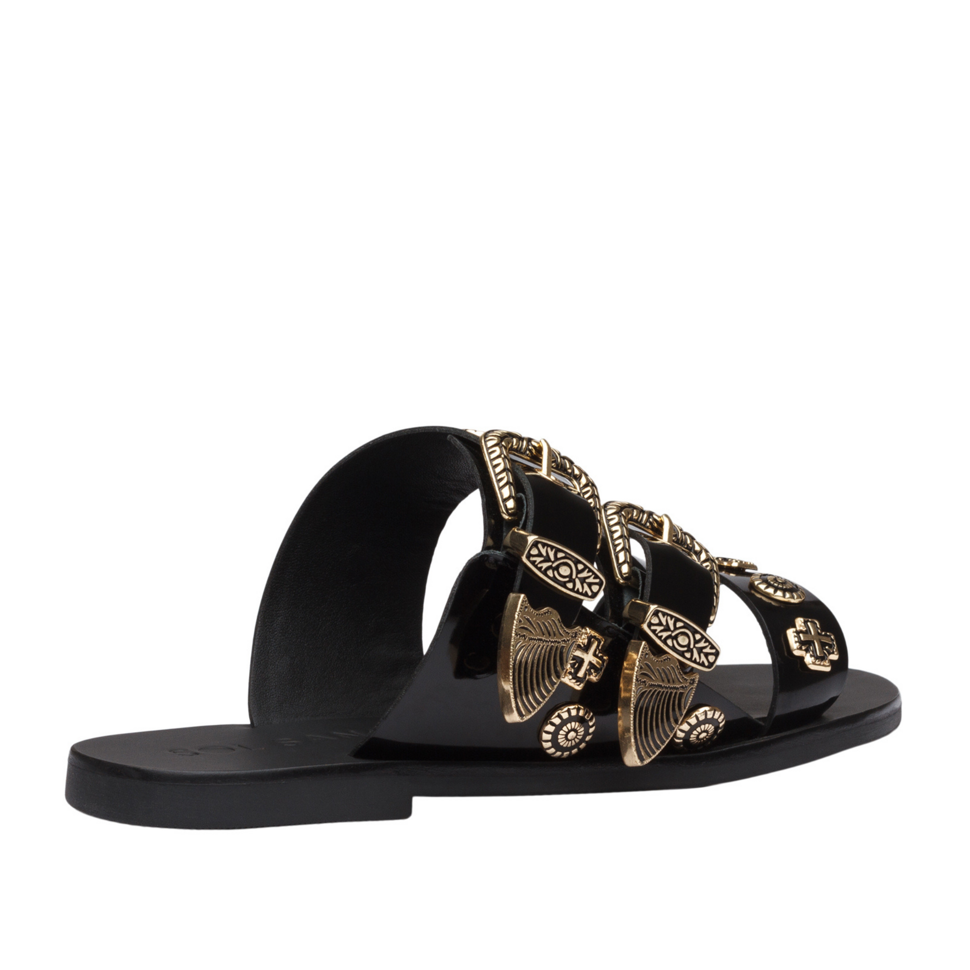 The best selling Eastwood slide takes the Western trend to new heights with statement buckles and cowboy inspired studs. Three prominent straps in a soft leather wrap the foot and sit atop a flattering almond shaped sole.