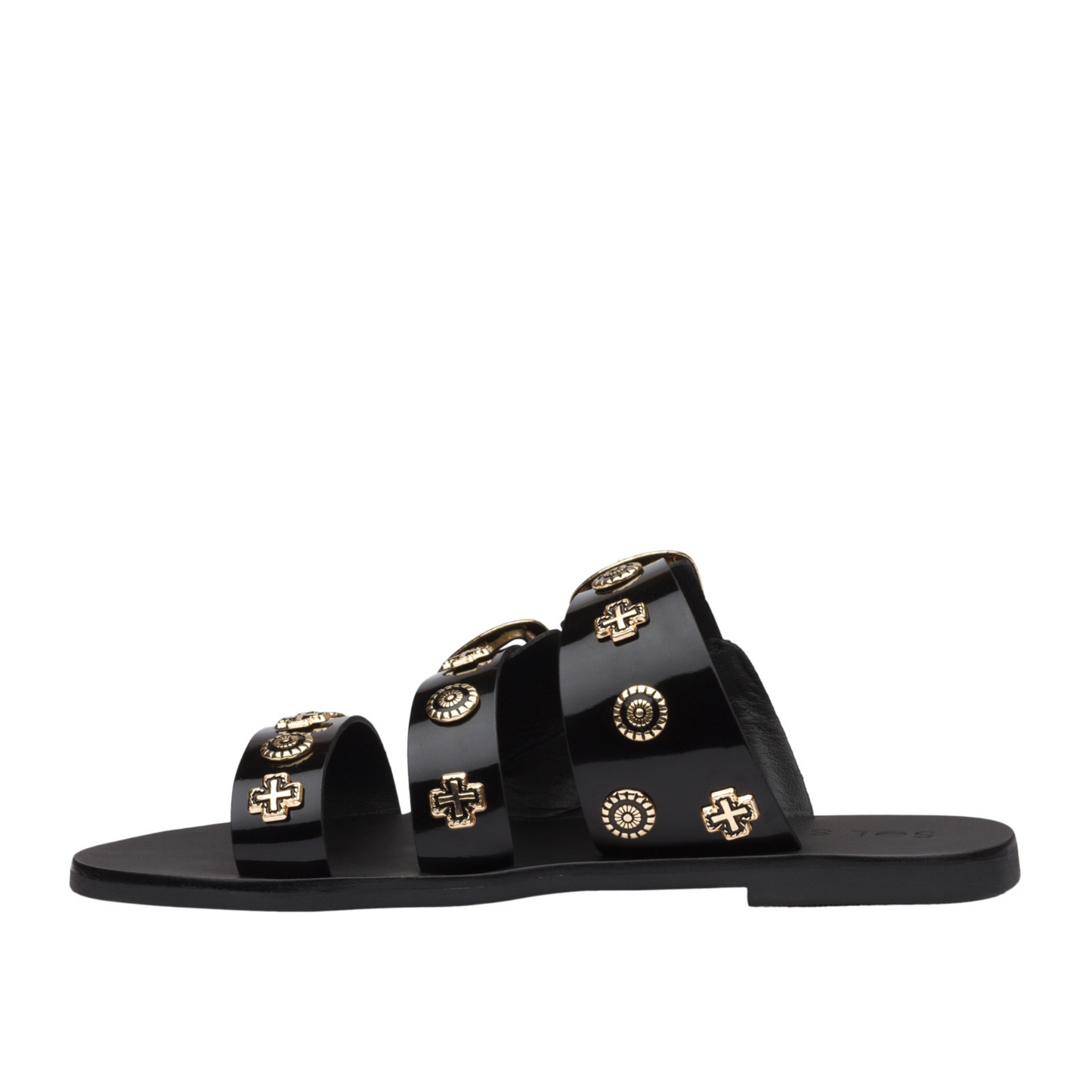The best selling Eastwood slide takes the Western trend to new heights with statement buckles and cowboy inspired studs. Three prominent straps in a soft leather wrap the foot and sit atop a flattering almond shaped sole.