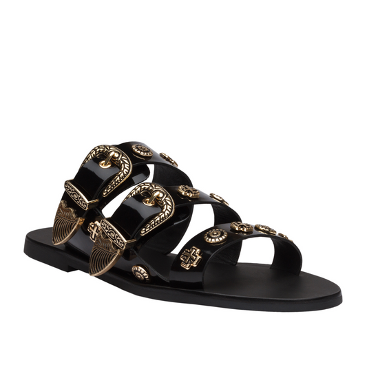 The best selling Eastwood slide takes the Western trend to new heights with statement buckles and cowboy inspired studs. Three prominent straps in a soft leather wrap the foot and sit atop a flattering almond shaped sole.