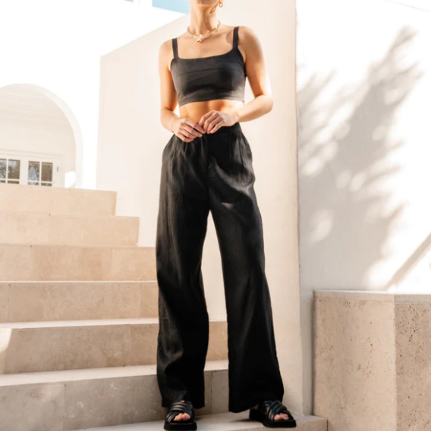 These Castaway linen pants by White Closet are 100% Linen and feature a high waist, belt loops, functioning side pockets and a tailored straight leg silhouette. The ultimate style and fit in a pant, with a pinch of fun!