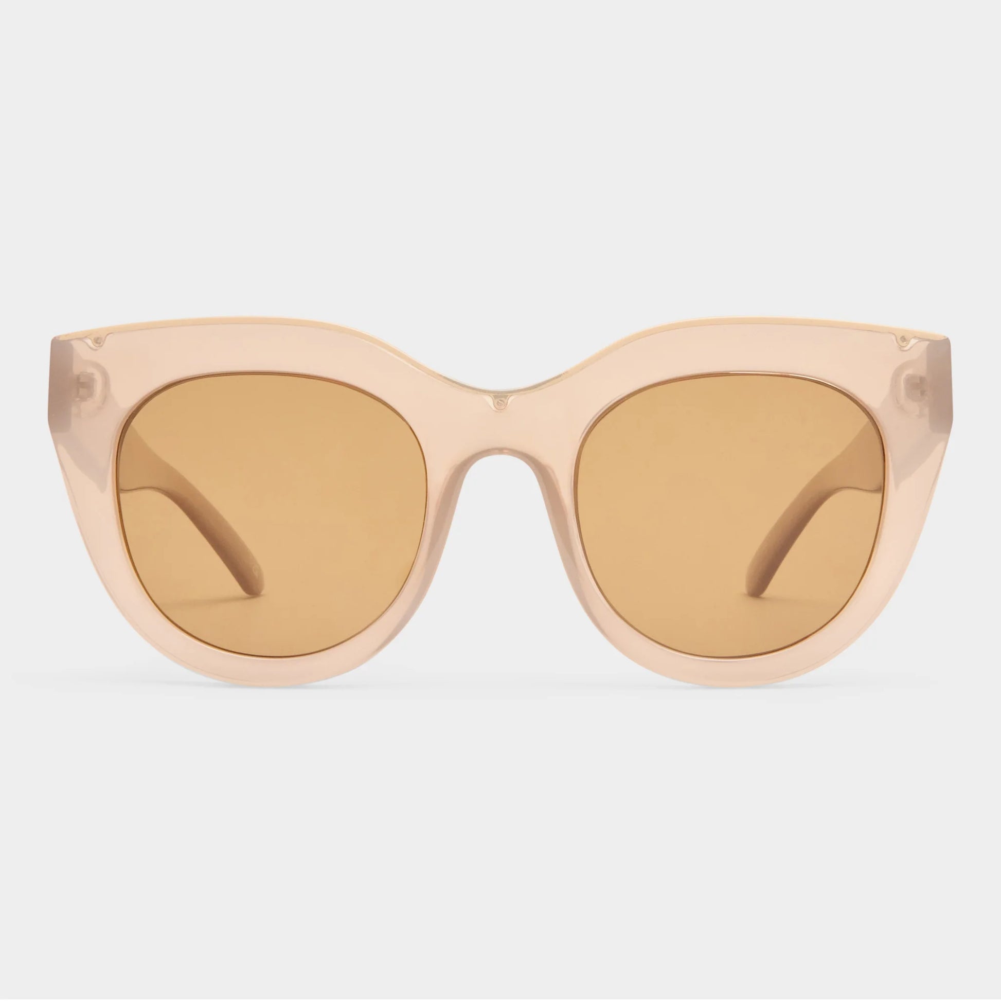 A favourite of Meghan Markle and Olivia Palermo, the AIR HEART silhouette is an iconic Le Specs style. With oversized and dramatic proportions reminiscent of a cat eye, the style is designed with a thick semi-translucent tan frame and luxurious metal top bar inlay, then fitted with premium zero base smoke flat lenses. The perfect statement sunglass to suit all face shapes.