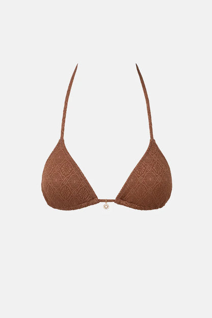 The Sunset Slide Tri Top in Chocolate is designed for A-C cup size with minimal coverage. It features an adjustable halter neck and midriff tie, removable padding, a decorative metal sun trim at the centre front, and a metal coin logo.
