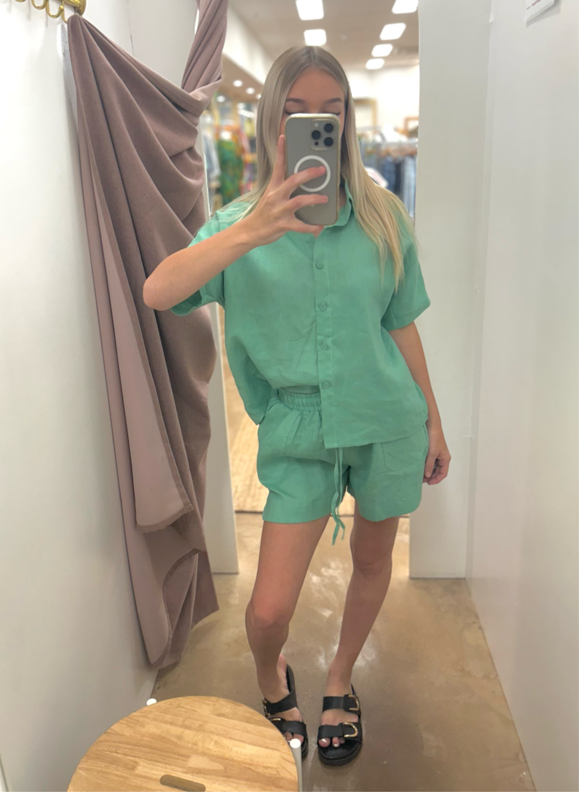 Indulge in luxury with our Mint Green Linen Top by Little Lies the Label. Made from high-quality linen, this top features a classic collar and sophisticated button-up front. Perfectly pairs with matching shorts or can be styled separately for a versatile and chic look. Elevate your wardrobe with this elegant and exclusive piece.