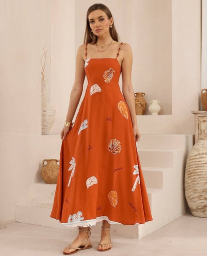 The Karoline Dress – Iris Maxi is your go-to statement piece for effortless elegance with a playful twist. Featuring the vibrant Iris Maxi print, this dress flows beautifully with every step, creating an easy, feminine silhouette that feels as good as it looks. The flattering neckline and relaxed maxi length make it perfect for long lunches, seaside strolls or summer celebrations.

Lightweight and breathable, the Karoline Dress is designed to move with you—dress it up with heels and jewellery or keep it cas