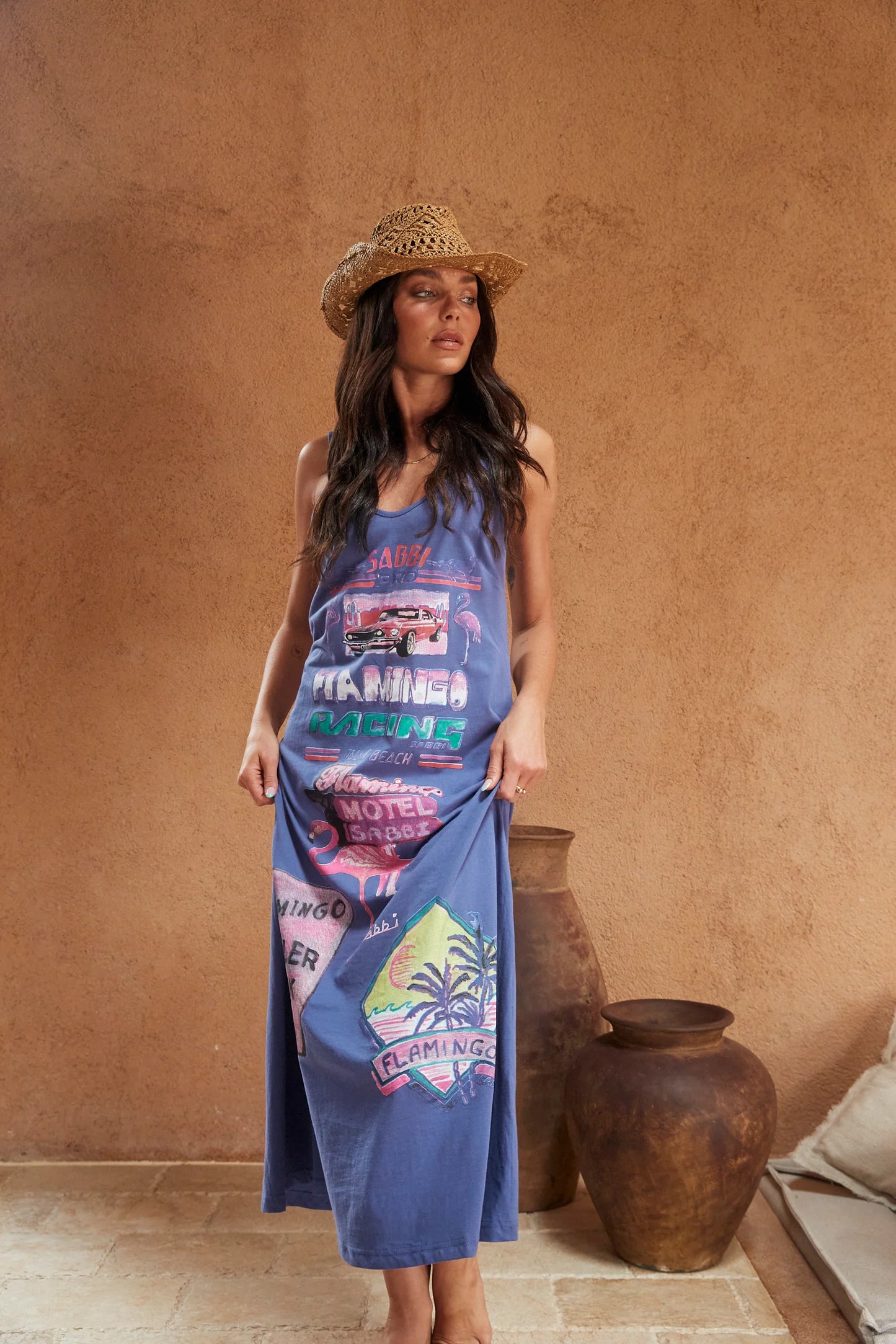 Dressing to impress in this baby...or in our case dress for comfort.
Crafted from soft 100% cotton, this stretch dress is made from the tee fabric to make it the comfiest dress to wear. Adjustable straps and beautiful prints both front and back.
