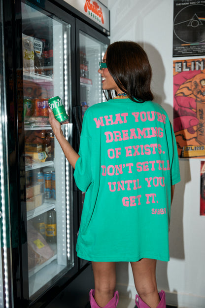 Go bold, dream big, and never settle in the Very Oversized Self Love Club Tee in Green. This statement piece serves up maximum comfort with its drop-shoulder, relaxed silhouette and premium cotton feel — perfect for those off-duty days or styled-up streetwear moments.