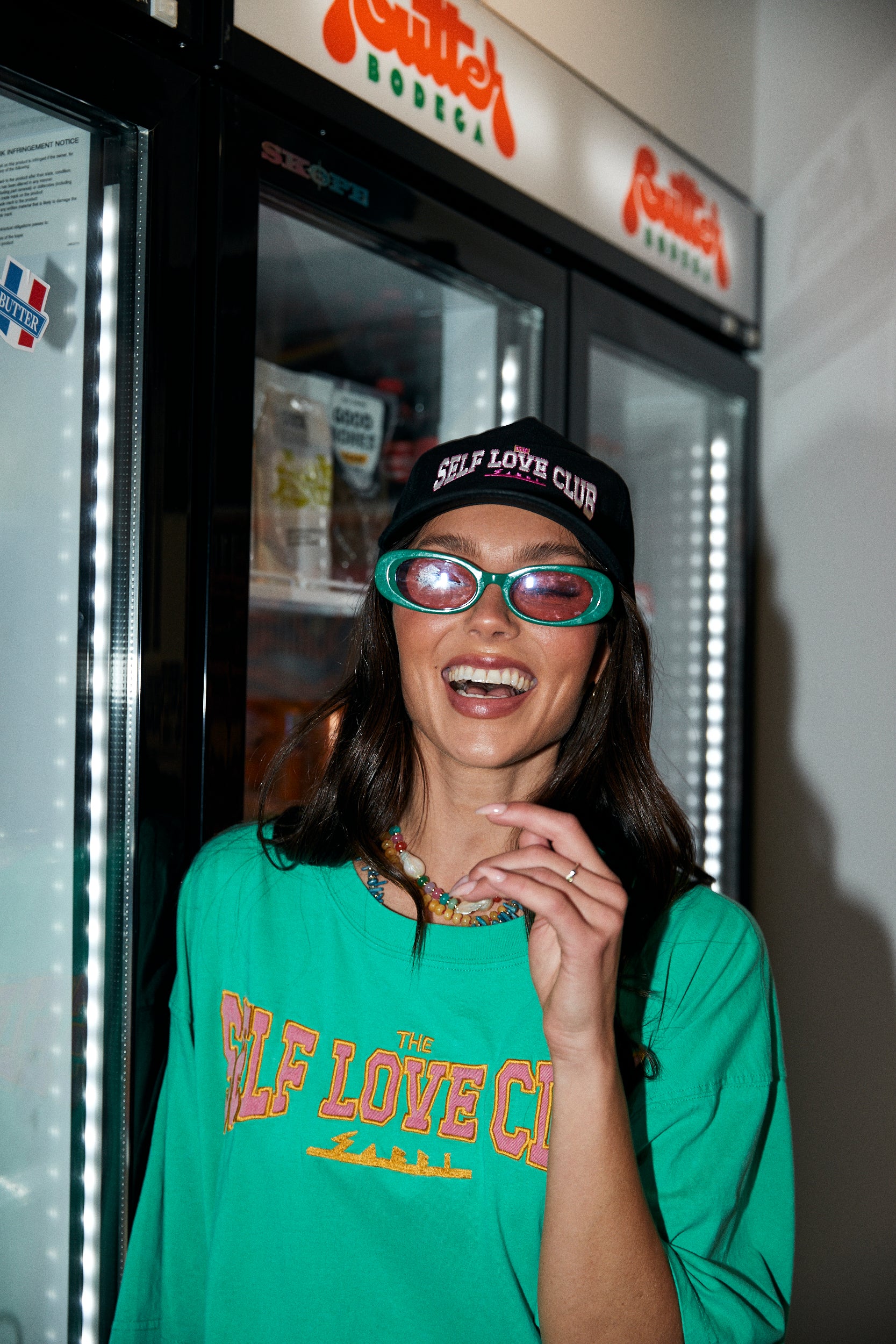 Top off your look with the ultimate dose of self-love energy. The Self Love Club Cap in Black is your go-to accessory for effortless cool and unapologetic confidence. Featuring bold embroidered “SELF LOVE CLUB” lettering in pink and white across the front, this classic curved-brim design is equal parts street style and statement piece.a

Crafted for comfort and everyday wear, it’s fully adjustable at the back for the perfect fit and includes a secret love note embroidered on the inside – “You are Magic – Lo