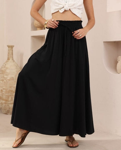 Iris Maxi - Flowy, flattering and made to move with you. The Melanie Pants – Iris Maxi are the ultimate blend of comfort and elegance, designed for effortless everyday wear with a polished finish.

Featuring a wide-leg silhouette and soft, fluid fabric, these pants drape beautifully while offering a relaxed, breathable feel. 