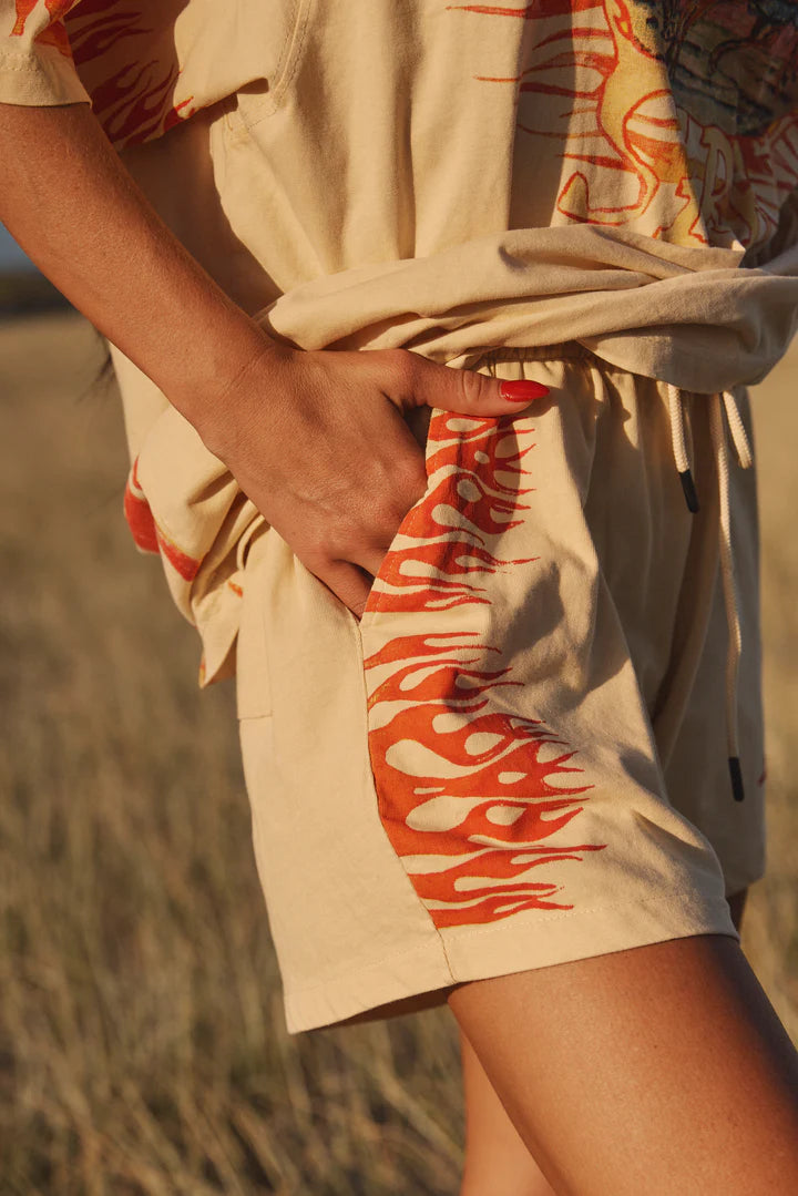 SABBI - Crafted from 100% cotton, the Flaming Cowboy Chido Shorts combine bold style with ultimate comfort.

Enzyme-washed for a vintage, lived-in look, these shorts offer a relaxed fit and breathable feel—perfect for everyday wear or making a statement.