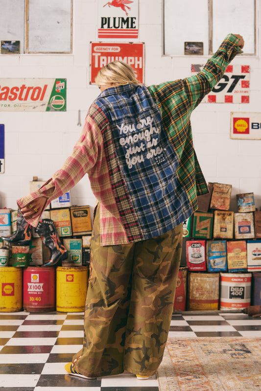 You Are Enough Flannel Shirt
A flannel with a whole lot of soul. The You Are Enough Flannel Shirt is your cozy reminder that you're perfect just the way you are. With its patchwork of vibrant checks and the powerful message “You are enough just as you are” embroidered on the back, this oversized button-up brings comfort, color, and confidence to your everyday look. Crafted for layering, lounging, or letting your true self shine — this shirt is a wearable affirmation.
