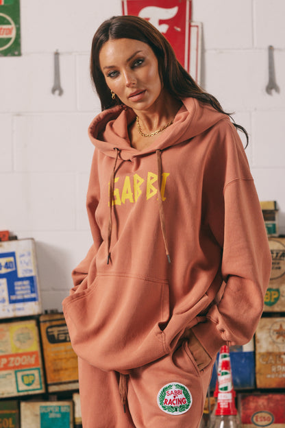 Stay bold, cozy, and kind in the Be Kind Hoodie in a warm terracotta hue. Made for comfort and attitude, this oversized hoodie features a standout yellow “SABBI” graphic across the chest, with dropped shoulders and a roomy front pocket for ultimate laid-back vibes. Crafted from premium cotton fleece, it delivers a soft, lived-in feel with a streetwear edge.