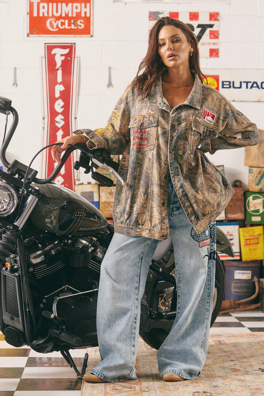 The Mermaid Wandering Jacket

Unapologetically bold and effortlessly cool, The Mermaid Wandering Jacket is where vintage moto vibes meet free-spirited rebellion. Designed in an oversized fit with a worn-in camo wash, this statement piece features intricate embroidery of our signature winged mermaid — a powerful symbol of freedom, femininity, and fearless adventure.