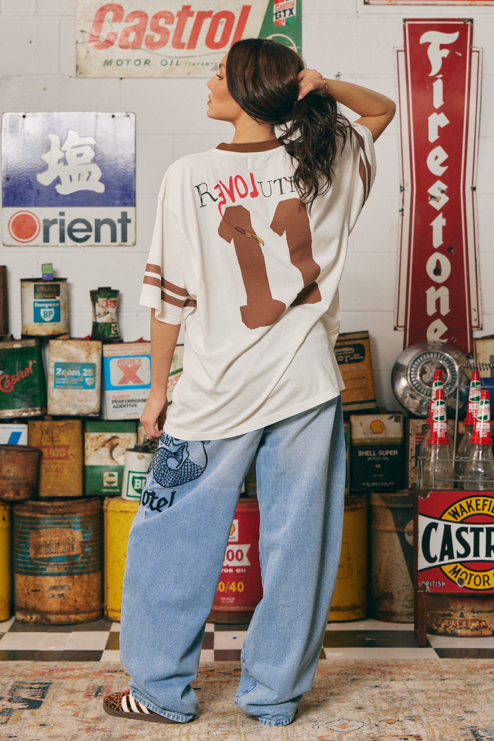 The Love Revolution Tee – Off White
Make a statement in soft neutrals with the Love Revolution Tee – Off White. Featuring bold chocolate-toned "LOVE" lettering, subtle pink rules detail, and varsity-inspired sleeve stripes, this oversized tee blends comfort with confident energy. Crafted from soft cotton with a relaxed fit, it's perfect for laid-back days or styled up with standout denim. Whether you're breaking the rules or rewriting them — this tee is all about leading with love.


