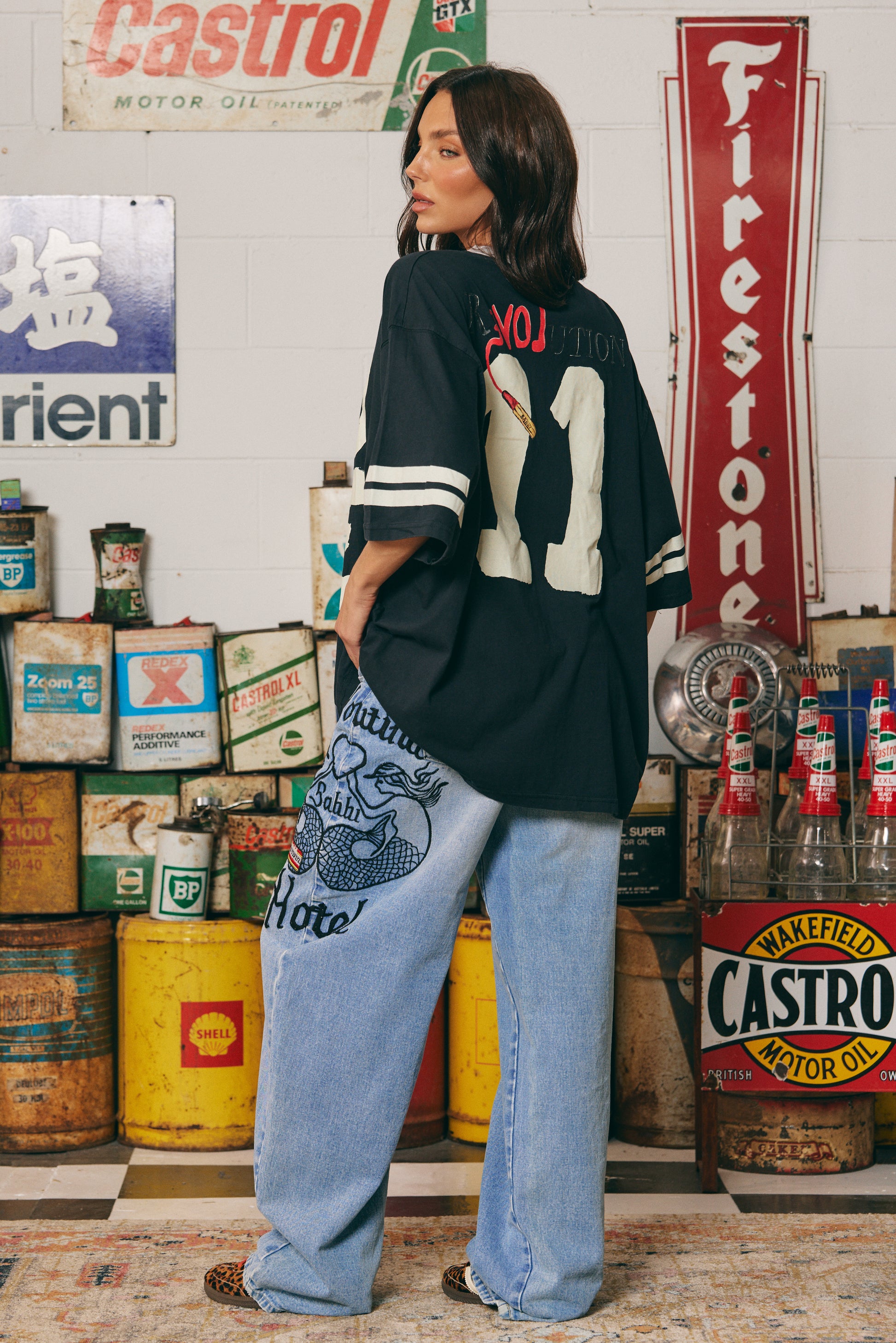The Love Revolution Tee – Black
Big love, zero rules. The Love Revolution Tee in Black is your go-to for fearless self-expression. Featuring varsity sleeve stripes, a relaxed oversized fit, and bold distressed-style "LOVE" typography with a pop of pink in “Rules,” this tee is a statement in more ways than one. Crafted from soft, breathable cotton and finished with SABBÍ’s signature edge, it’s made for rebels with heart.

Style it with denim, sneakers, or leather — and lead your own revolution.