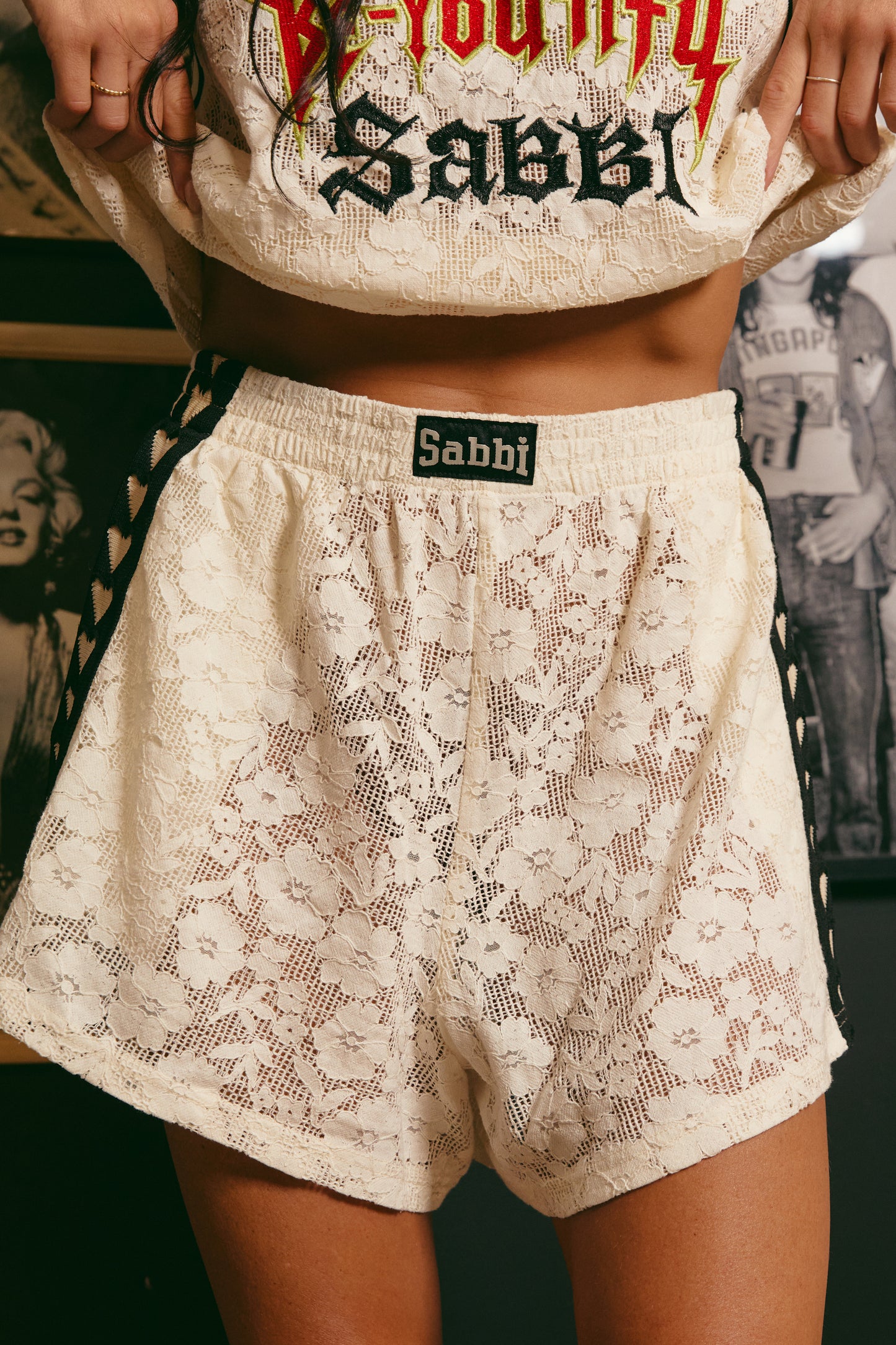Playfully feminine with a rebellious edge, The Mini Hearts Lace Shorts - Cream are your new wardrobe MVP. Crafted from soft, floral lace in a dreamy cream hue, these shorts fuse sport-inspired energy with romantic details for a look that’s equal parts sweet and bold.