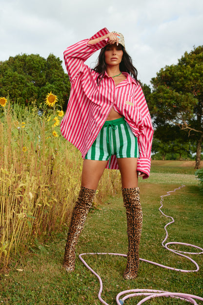 THE KNIT STRIPE BIKE PANTS – GREEN STRIPE - SABBI

Say hello to your new obsession: the Knit Stripe Bike Pants – Green Stripe. Bursting with playful personality and bold summer energy, these knitted shorts are here to make every outfit a vibe. Featuring alternating green and mint crochet stripes, they bring a nostalgic, handcrafted feel with a seriously modern edge.