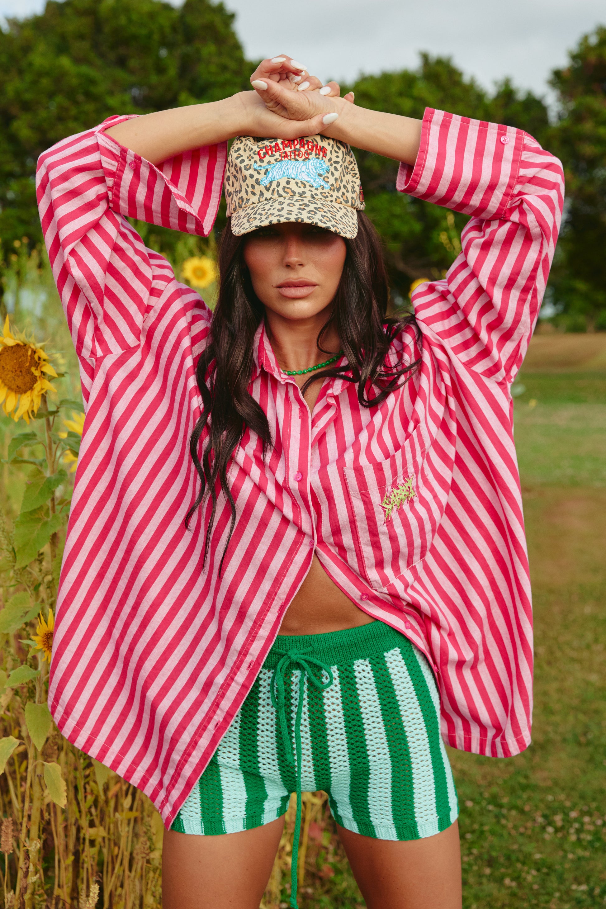 THE KNIT STRIPE BIKE PANTS – GREEN STRIPE - SABBI

Say hello to your new obsession: the Knit Stripe Bike Pants – Green Stripe. Bursting with playful personality and bold summer energy, these knitted shorts are here to make every outfit a vibe. Featuring alternating green and mint crochet stripes, they bring a nostalgic, handcrafted feel with a seriously modern edge.