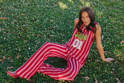THE KNIT B-BALL SINGLET – RED STRIPE - SABBI

Bring the heat, steal the spotlight, and play by your own rules in The Knit B-Ball Singlet – Red Stripe. Serving retro varsity energy with a bold Sabbi twist, this statement knit is made for the girls who don’t just enter a room—they own it.