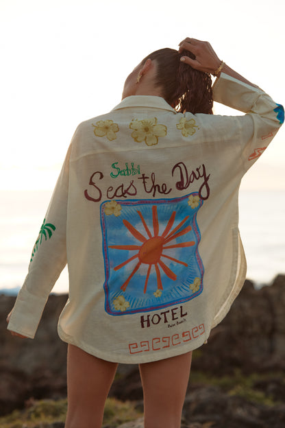 Sabbi - Meet the shirt that does it all. The Don Julio Shirt in Cream – Seas The Day is your throw-on-and-go statement piece, blending effortless coastal cool with bold, hand-drawn Sabbi artwork. Lightweight, breezy and intentionally oversized, it’s made for salty skin, sun-faded afternoons and dancing straight from beach to bar.