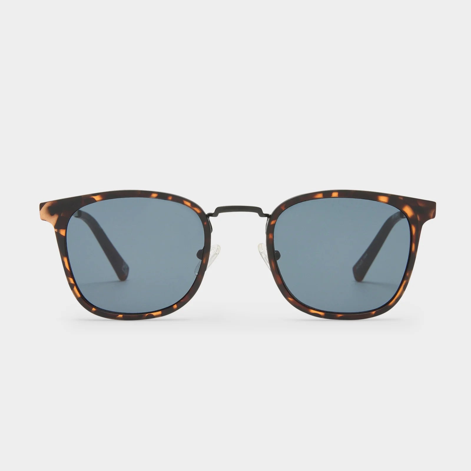 RACKETEER | MATTE TORT - Defined by its bespoke metal encased construction, this fine-framed silhouette features a masculine edge with its matte texture frame. Fitted with spring hinges and adjustable nose pads for a tailored fit.

• Finished in a masculine matte dark tort with tonal dark lenses.
• Made using BPA free polymer plastic which is lightweight, durable and impact resistant.
• Fitted with shatterproof and scratch resistant polycarbonate lenses.