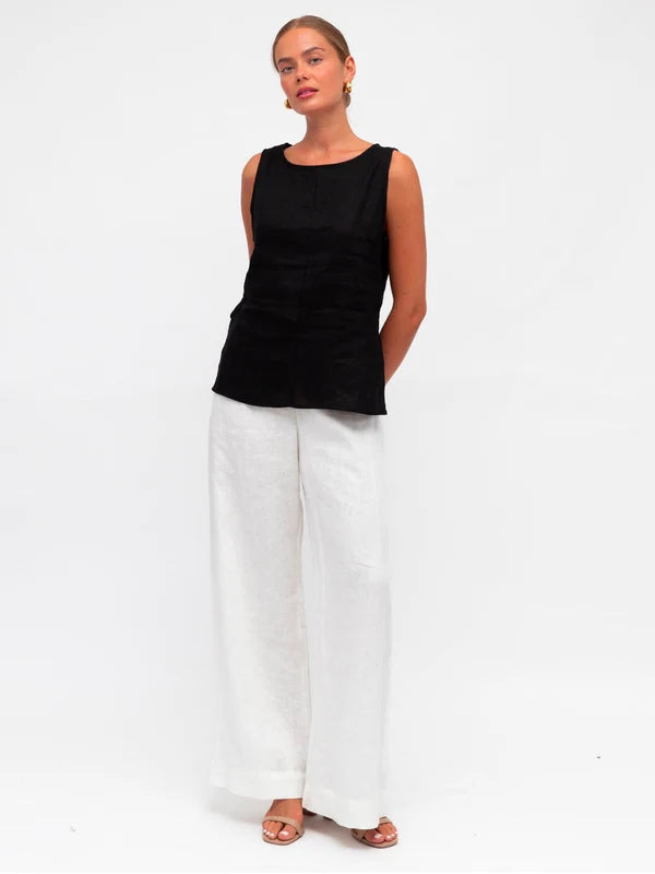Stay cool and chic in this sleeveless tank. With a crew neckline, zipper in the back, and side splits, it's as functional as it is stylish. And did we mention it's made of luxurious linen fabric? You'll look and feel your best in the Linen Luxe Tank - Black