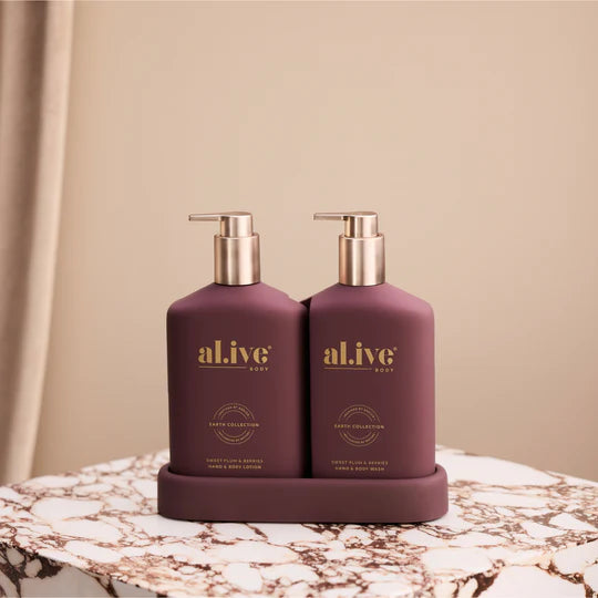 al.ive - Our exclusive Sweet Plum &amp; Berries scent featuring native Davidson Plum in signature interlocking bottles with Limited Edition mulberry colourway. Rich in Australian botanicals and antioxidants, this luxurious duo transforms daily care into moments of festive indulgence.