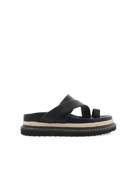 Armas by Billini is a platform slide.

Elevate your collection with this chunky, luxe platform slide.

Featuring;

platform sole with statement rope detailing
open soft almond toe
wide crossover straps on upper with separate toe ring
slight cushioned straps
easy slip on design
open heel counter
synthetic upper, lining and outsole