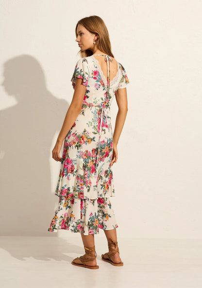 The Allison Midi Dress by Auguste the label in our vintage-inspired Iris floral has you ready for any event. It features a flattering V-neckline with a lace insert and subtle cut-out details at the center front and under bust, feminine short flutter sleeves, and a bias-cut silhouette that gracefully drapes to the shape of your body.