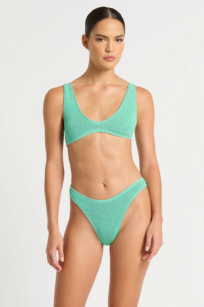 The Christy Brief features a 90's style, high-cut silhouette and high waistline, flattering your figure and providing cheeky to moderate coverage.&nbsp;Handcrafted in Sydney, Australia from The Authentic Crinkle™.