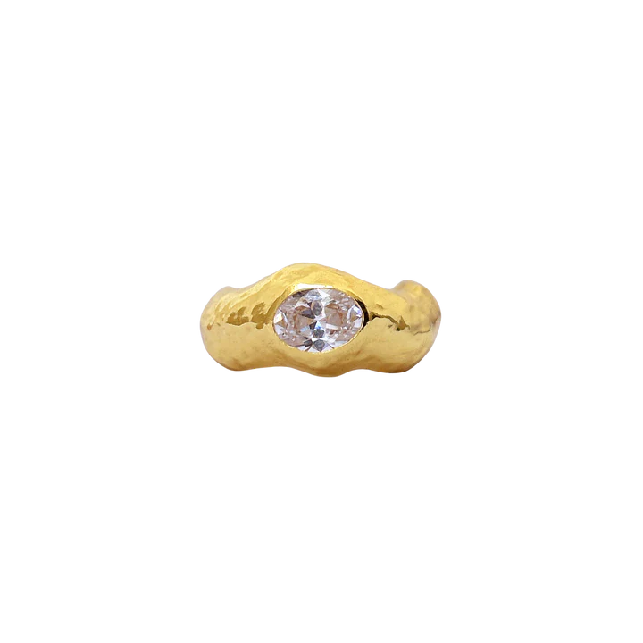 Introducing the Bleecker Ring, let's start by saying she is oh so chic and very cool! Boasting a chunky hammered texture band and a dazzling faceted White CZ in a seamless setting. The Bleecker Ring is fluid and more undone in comparison to our more structured cocktail ring styles which makes her an effortless styling accessory. The Bleecker has been designed to stack perfectly with the Billie Ring, though she is ever so striking all on her own. The Bleecker brings the edge without trying too hard...