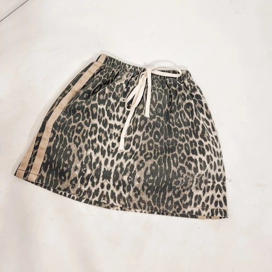 Hottest new skirt, one not to miss! - Become your Ferocious self in our new Racer Leopard Skirt!

A beige strip along each side of leg

We love how cool and comfy it is.....