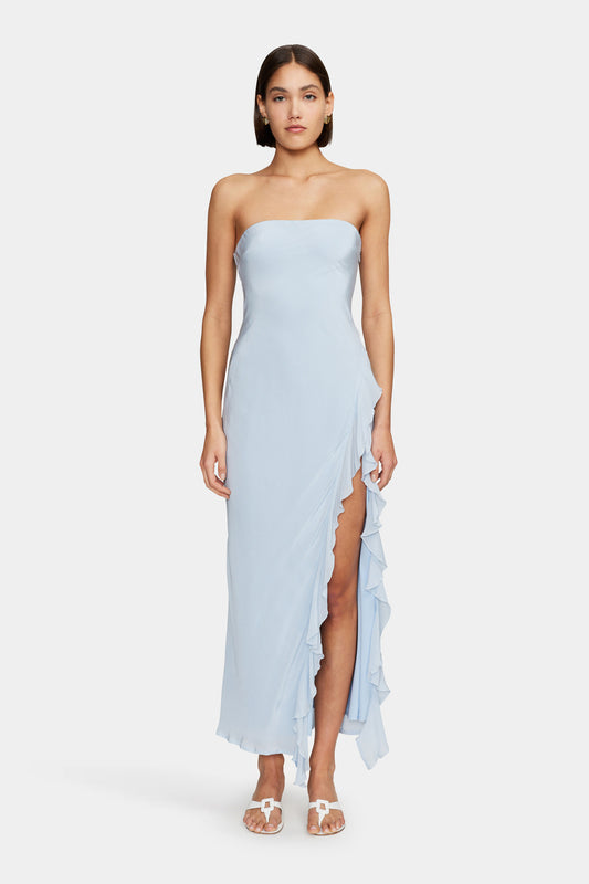 Effortlessly chic and timeless, the Calista Maxi Dress in Sky by Ownley is your go-to piece for dreamy, feminine style. Featuring a soft blue hue, a flattering silhouette, and flowy fabric, this dress is perfect for summer events, beachside dinners, and special occasions. Elevate your wardrobe with this must-have maxi dress!