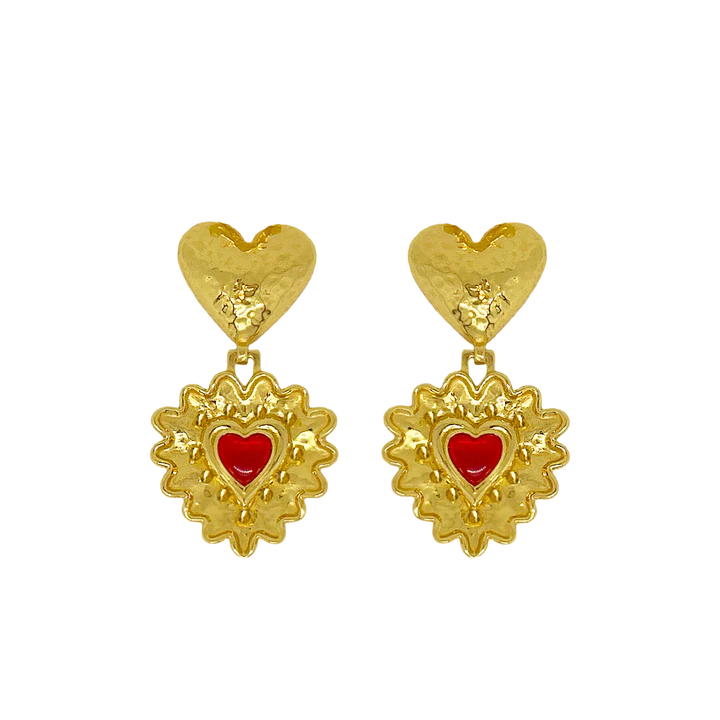 Introducing the divine Cordelia Earrings. Embrace all-consuming love and channel your inner romantic protagonist wearing these beauties. The Cordelia are adorned with a double heart motif reimagined in the most iconic way.