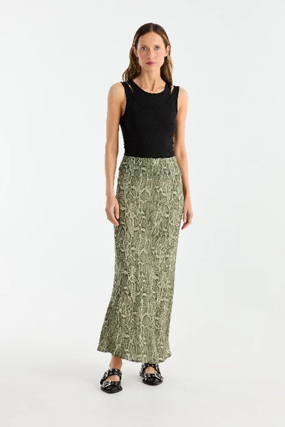 Animal-printed georgette skirt designed with a bias cut to create a graceful and flattering silhouette. Featuring a maxi length and an elasticated waistband, this pull-on style combines ease of wear with a bold, striking aesthetic.