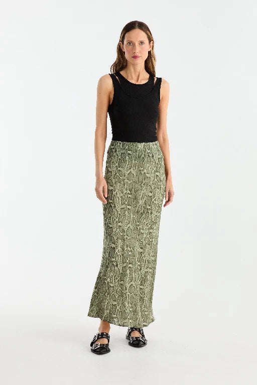 Animal-printed georgette skirt designed with a bias cut to create a graceful and flattering silhouette. Featuring a maxi length and an elasticated waistband, this pull-on style combines ease of wear with a bold, striking aesthetic.