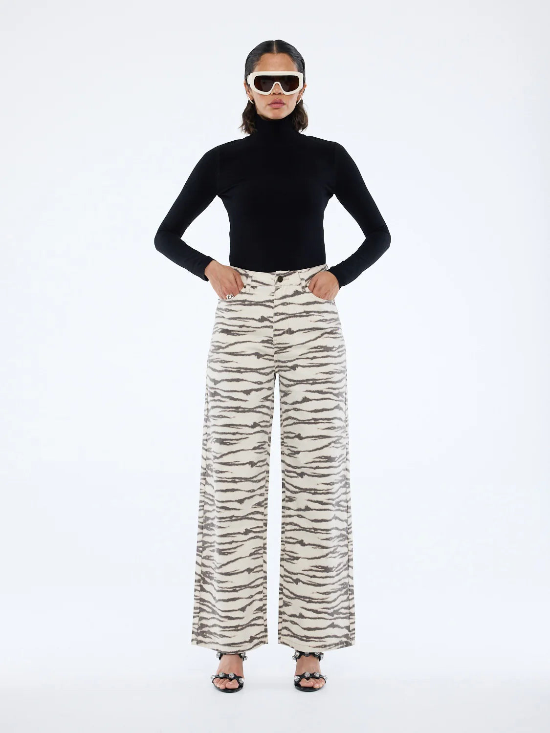 Statement print. Effortless shape.
The Tilly Jean is cut high at the waist with a wide-leg silhouette in a tiger print colourway.
Crafted from soft, draped denim, it's an elevated staple designed to anchor your wardrobe season after season.