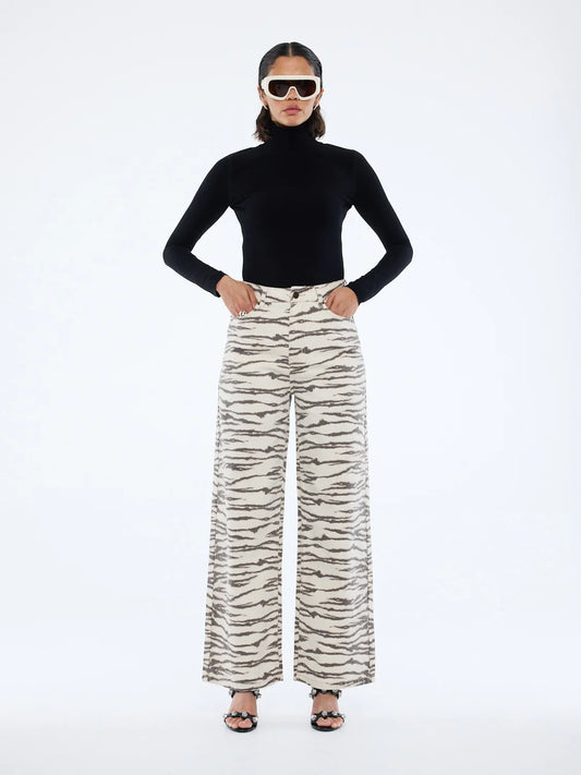 Statement print. Effortless shape.
The Tilly Jean is cut high at the waist with a wide-leg silhouette in a tiger print colourway.
Crafted from soft, draped denim, it's an elevated staple designed to anchor your wardrobe season after season.