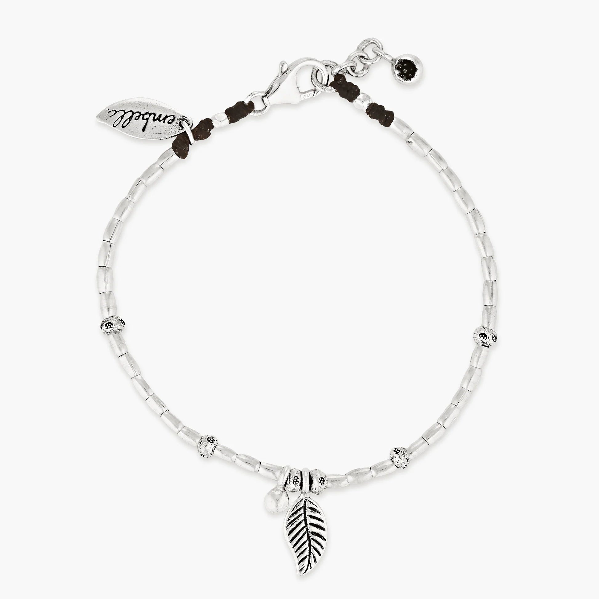 Embark on a dreamy island adventure with our Island Dreaming Anklet. Handcrafted with love, this anklet features Hilltribe Silver beads and charms that exude bohemian charm and coastal elegance. The Poly Wax cotton cord adds a touch of natural texture, while the Sterling Silver clasp and adjustable link ensure a secure and comfortable fit. Let the Island Dreaming Anklet be a reminder of carefree days and the beauty of island living.